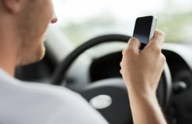 Texting-while-driving-300x195